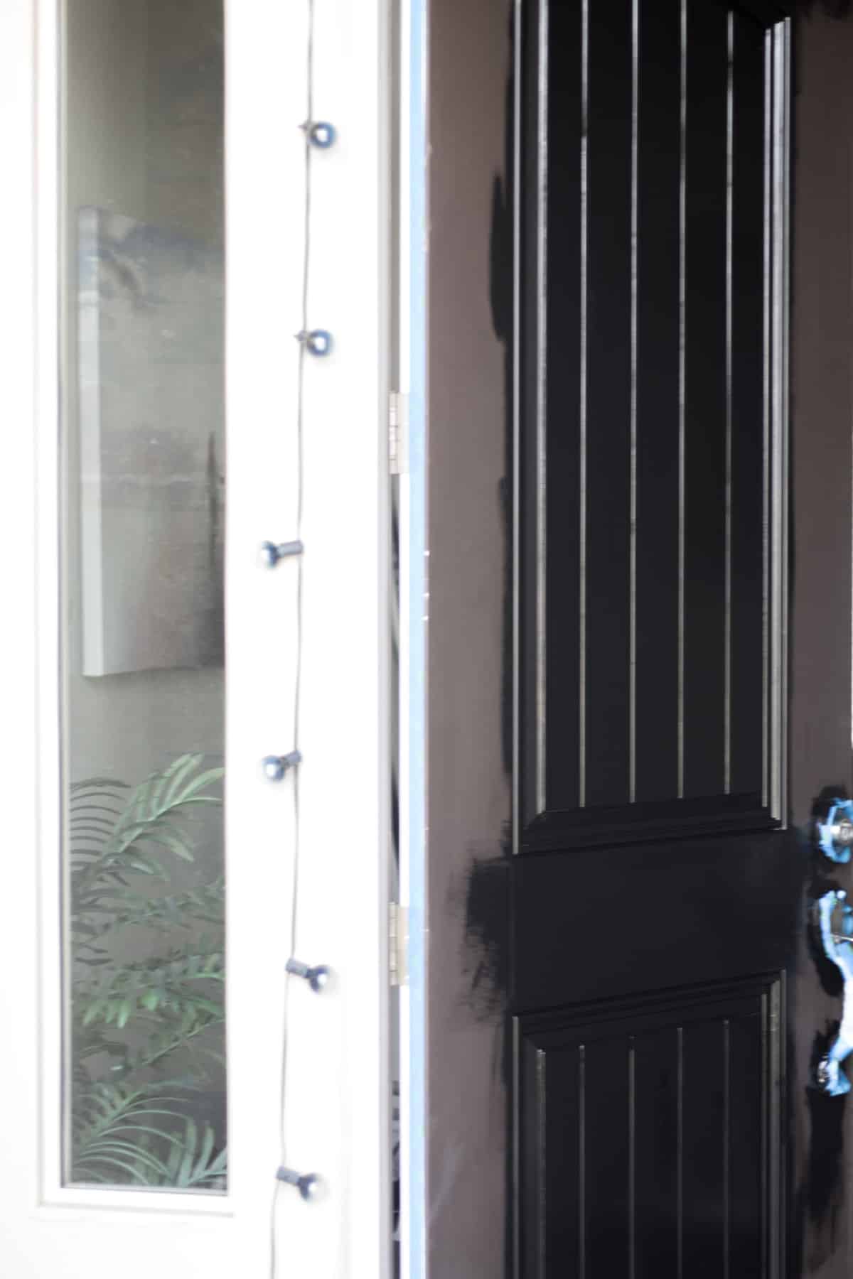 Repainting your door is really simple. It won't take you long at all and all you need to do is tape off what you don't want painted! It will make such a big difference in your curb appeal.