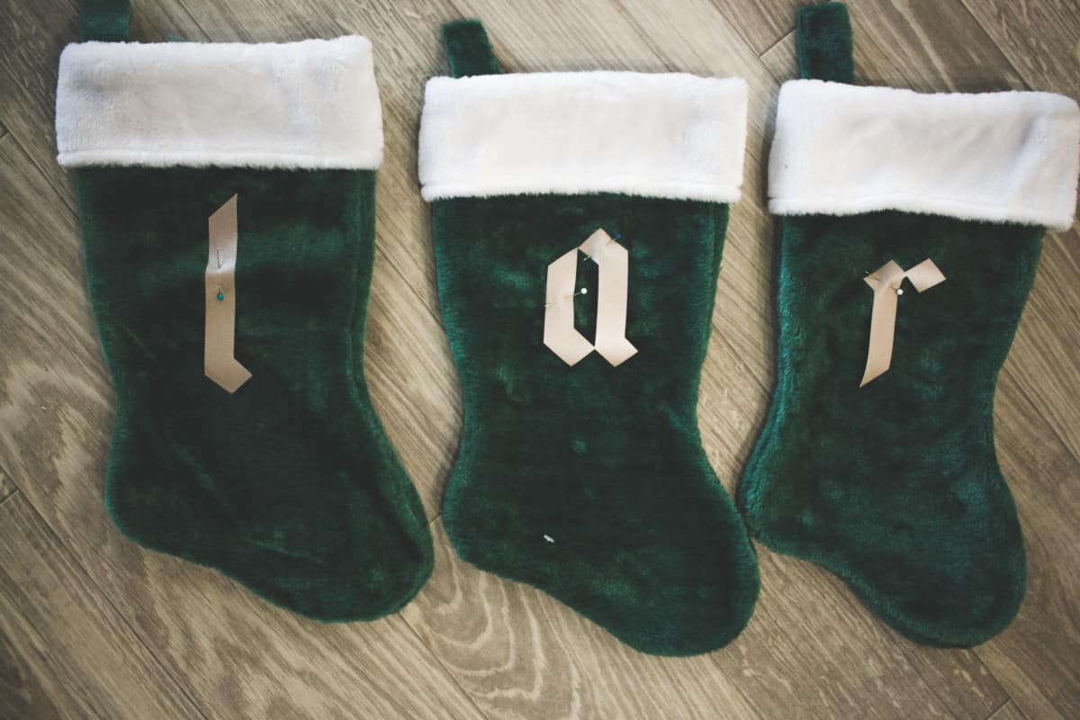 Upcycle your $2 walmart stockings with the Cricut for this modern cool look! #cricutholiday