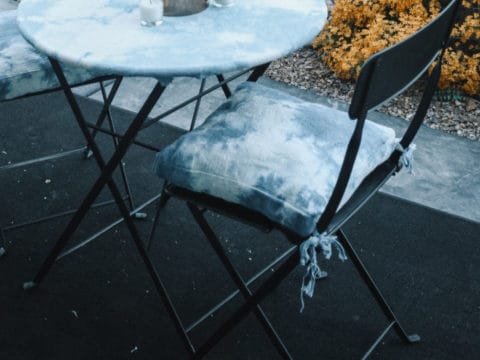Use a drop cloth to make a cushions for your patio set or bistro set. I use some indigo dye to create this unique and trendy look.