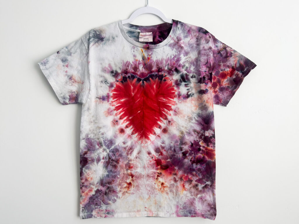 Front view of finished heart tie dye shirt using sinew and ice dye technique