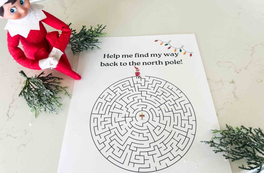 Printable Elf on the Shelf maze game, showing the elf holding a pencil and ready to complete the Christmas activity.
