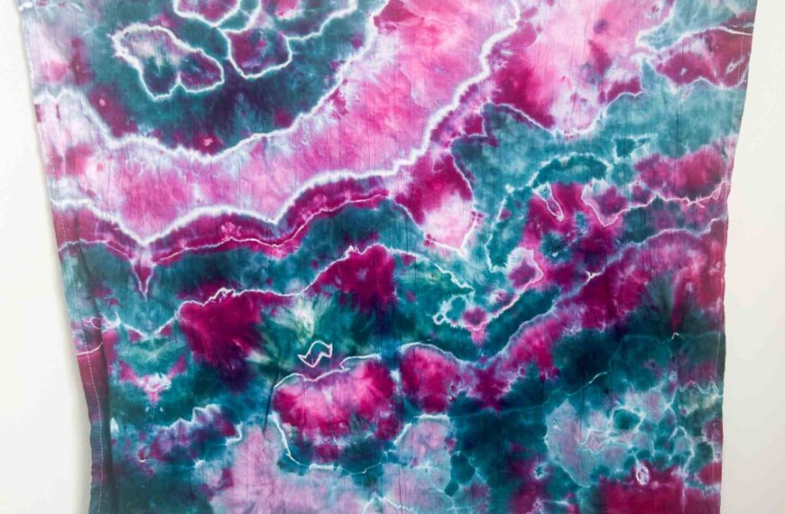 Finished geode towel dyed with the hot water irrigation tie-dye method in Amethyst and Kingfisher pinks and blues.