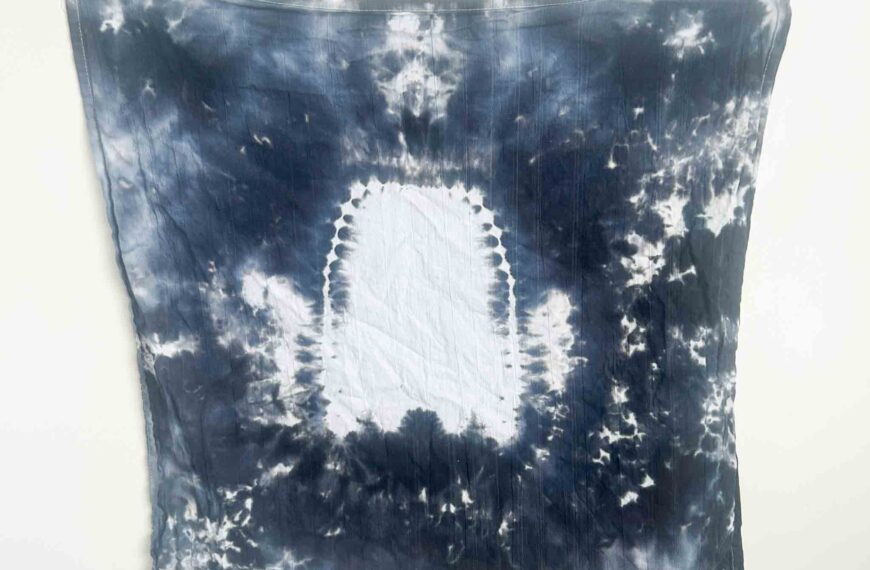Finished black and white ghost tie dye towel with clear ghost silhouette created using hot water method for Halloween