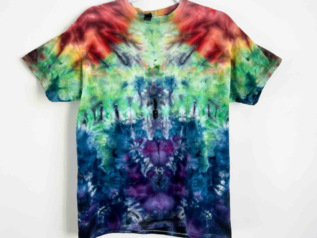 Double scrunch ice dye technique shirt with bright rainbow colors and organic texture