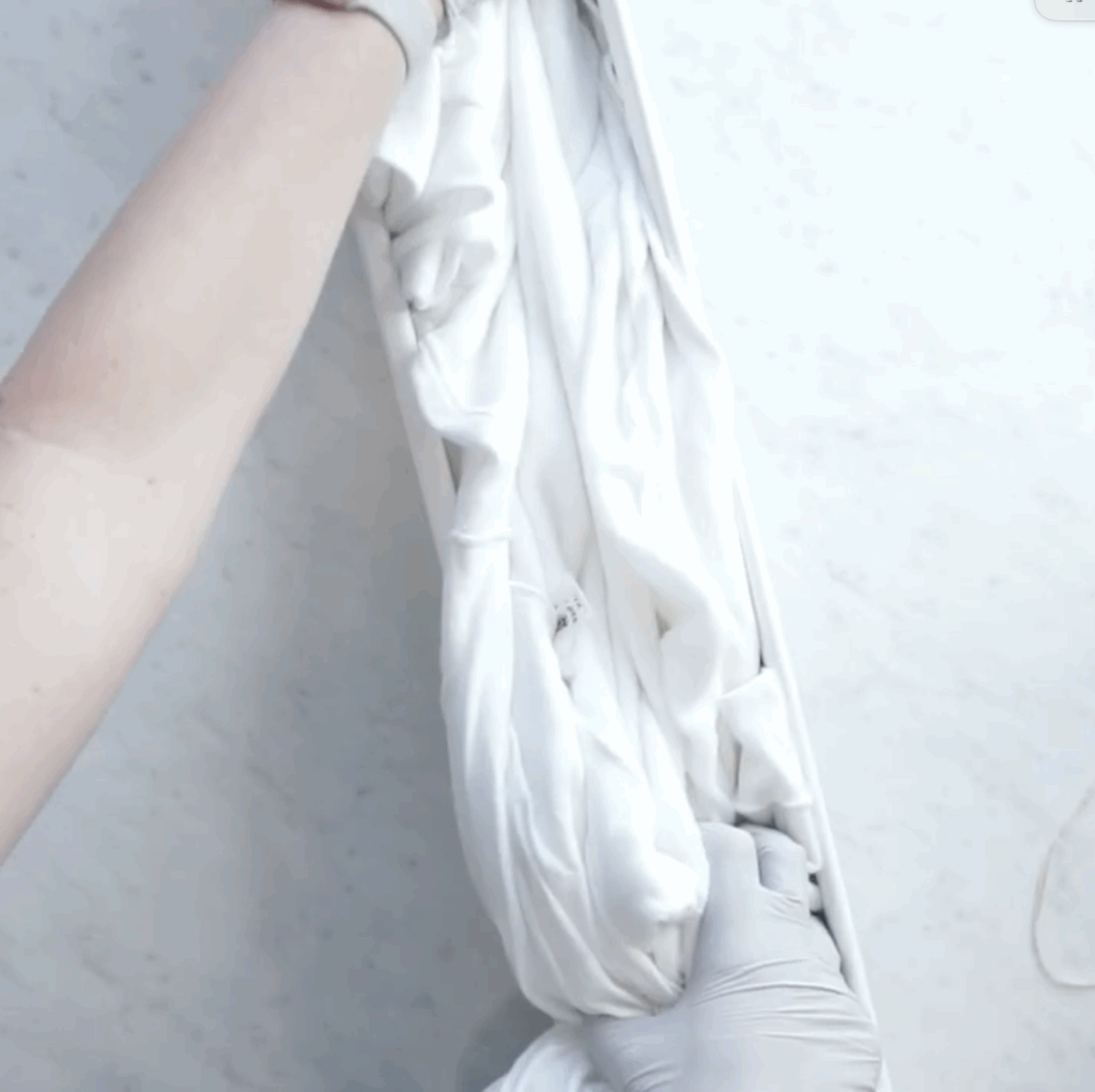 Loose fanfold technique for creating a gravity tie dye hoodie pattern