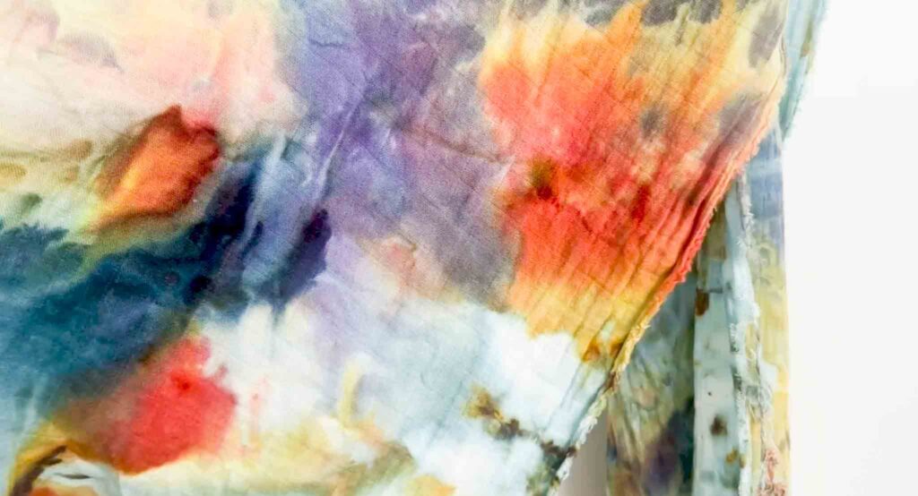 Bamboo gauze fabric dyed with Phoenix Flame and Avalon, showing soft watercolor blending with minimal flow.