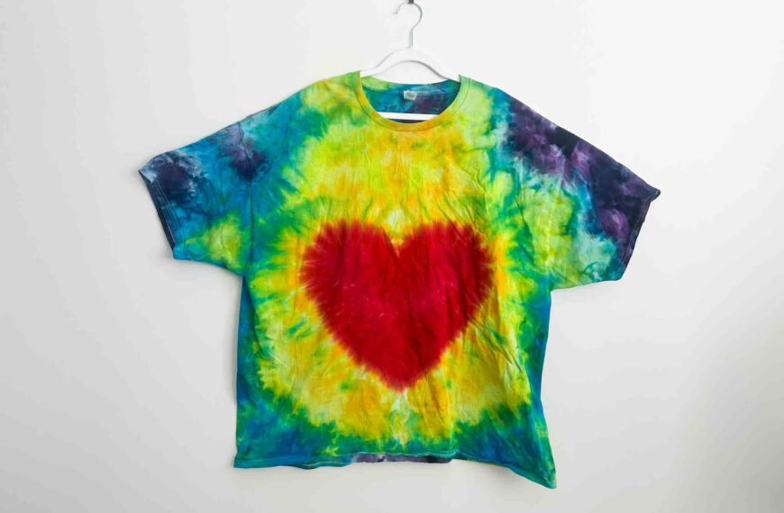 Rainbow heart tie dye shirt with red heart center and bright ice dyed background