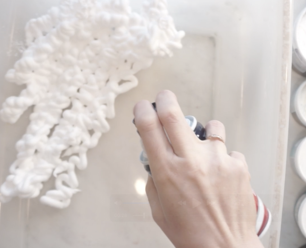 Shaving cream base prepared for shaving cream tie dye shoes in a plastic container