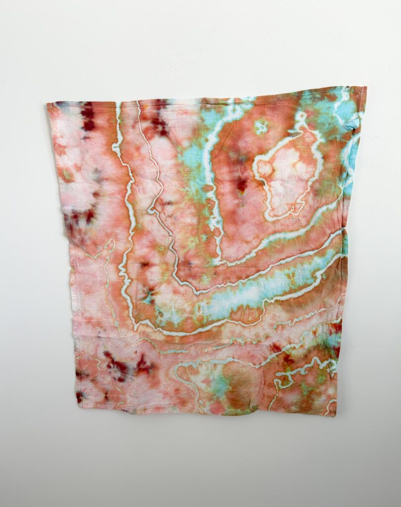 Nova Dharma ice dye swatch in peach and turquoise