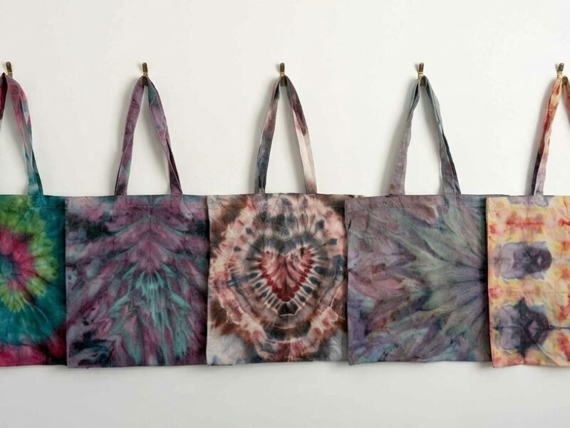 5 tie dye tote bags lined up. Beginner friendly fold ideas
