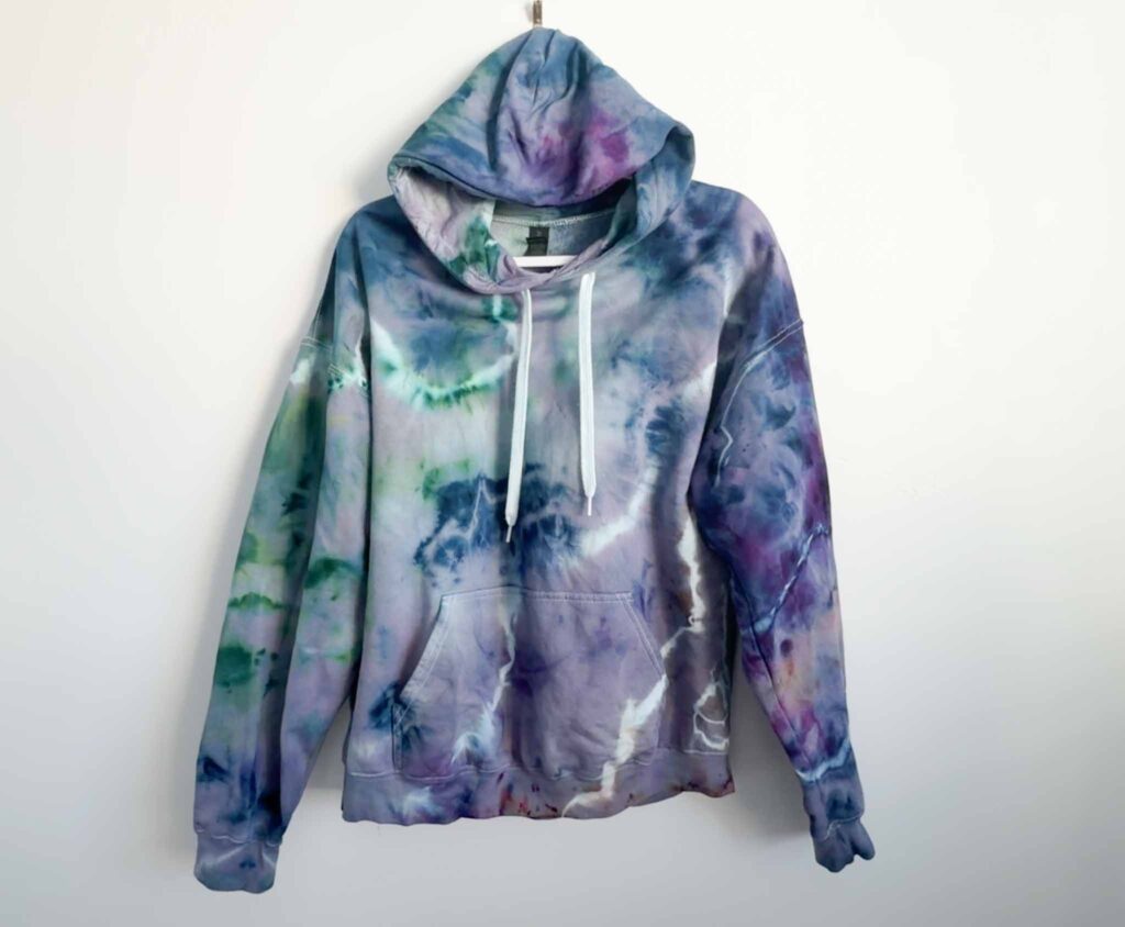 Geode tie dye pattern on a Gildan Softstyle midweight hoodie in purple and blue