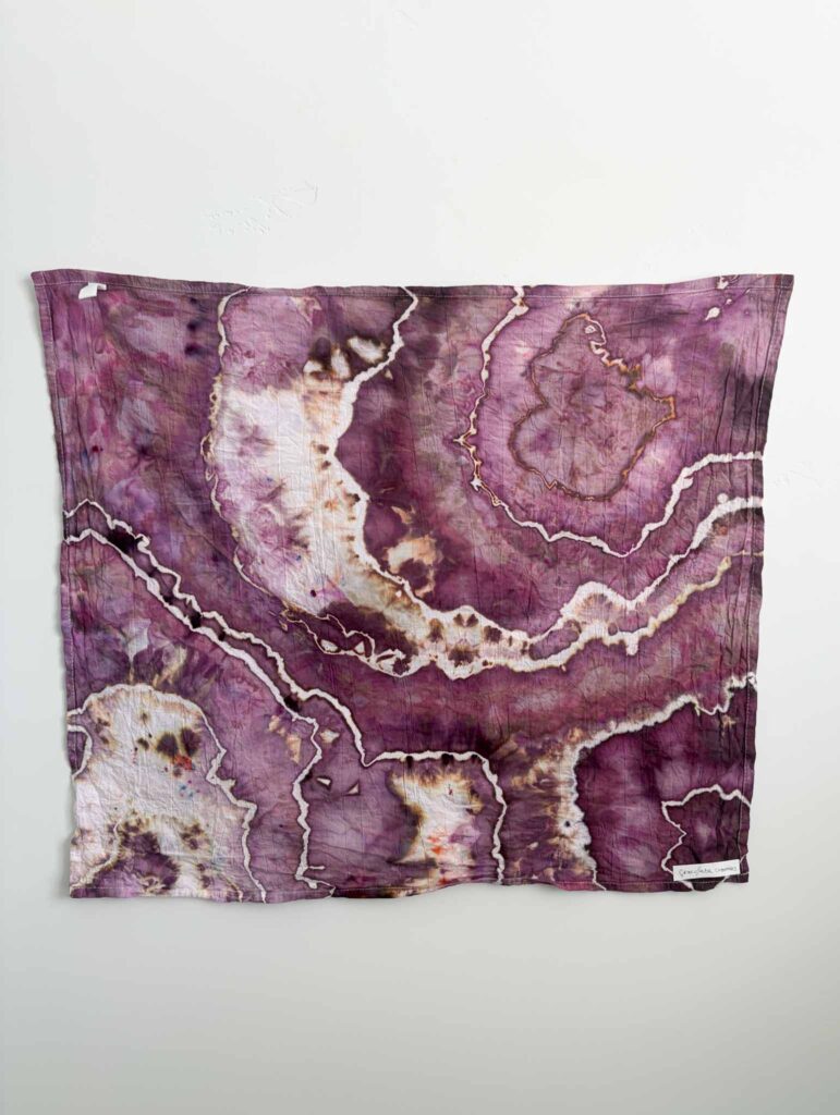 Geode tie dye towel in Dharma x Dalula Chocolate Cherries, a plum maroon ice dye with brown and tan splits
